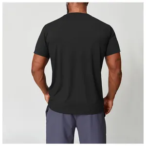 Back view of a black athletic crew neck quick-dry sports t-shirt on a fit male model.