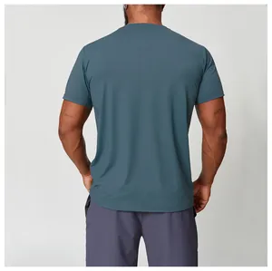 Detail back view of a men's teal quick-dry athletic t-shirt designed for sports and fitness