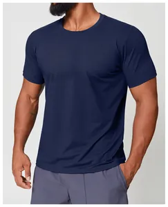 Detail of navy blue quick-dry athletic t-shirt showing fit and fabric texture.