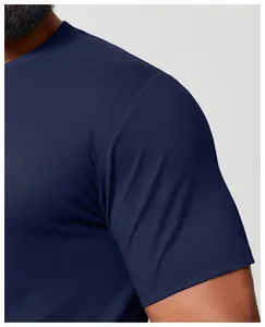 Close-up detail of navy blue quick-drying athletic T-shirt shoulder and sleeve