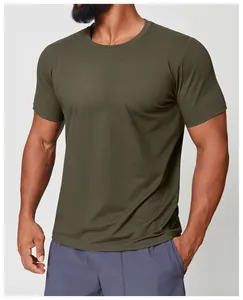 Close-up detail of a men's olive green crew neck quick-dry athletic T-shirt on a model