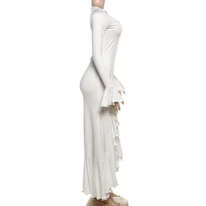 Side view of elegant white slim-fit maxi dress featuring flared ruffle sleeves