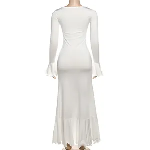 Back view detail of elegant white long sleeve slim fit dress with ruffled fishtail hemline