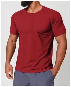 Close-up of men's burgundy quick-dry athletic crew neck T-shirt with athletic fit