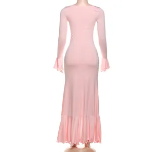 Back view of elegant pink long-sleeved slim-fit maxi dress with ruffled hem
