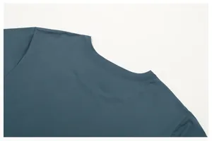 Close-up of the crewneck and shoulder stitching on a blue men's quick-dry sports t-shirt