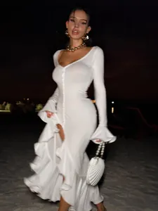 Elegant white long sleeve V-neck maxi dress with ruffled hem and front slit for women