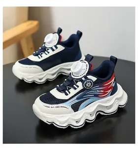 Close-up of girl's breathable mesh sneakers with wavy soles in navy blue and white