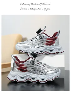 Side view of lightweight girls' breathable silver mesh sneakers with wavy thick soles.
