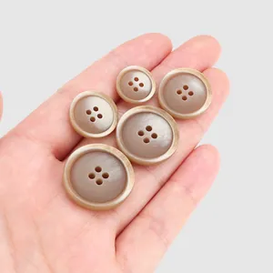 High-quality brown resin buttons in various sizes for coat and clothing accessories