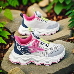 Girls breathable mesh running shoes with rotary dial closure and chunky wavy sole