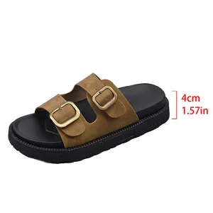 Detail showing the 4cm platform height measurement on a brown buckle strap sandal