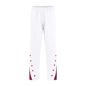 Pantaloni sportivi bianchi da uomo di alta qualità con finiture scozzesi rosse e pois laterali