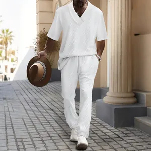 Close-up detail of men's casual white jacquard V-neck short sleeve and pants set