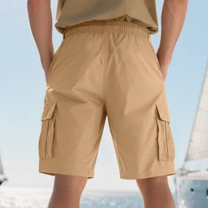 Back view of men's khaki cargo shorts featuring elastic waist and large side pockets