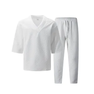 White men's casual two-piece summer set featuring an embossed geometric jacquard pattern.