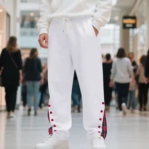 Pantaloni della tuta bianchi da uomo pesanti con pois rossi e fodera scozzese