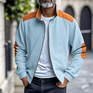 Detailed view of the stylish light blue corduroy jacket with contrasting orange patches