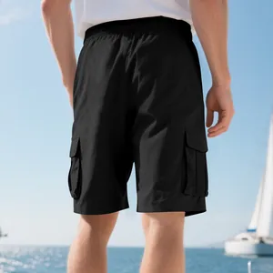 Back view of men's loose black cargo shorts with multi-pockets for summer.