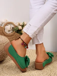 Stylish green bow platform wedge sandals for women, perfect for summer beach vacations