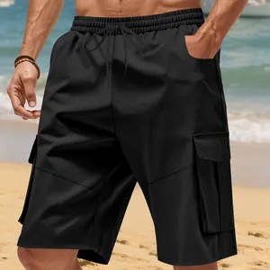 Close-up of black men's cargo shorts with functional pockets and drawstring waist