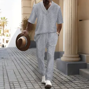 Men's grey jacquard leisure set with short sleeve V-neck top and matching trousers