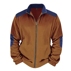 Front view of men's vintage brown velvet jacket with blue contrast shoulder patches.
