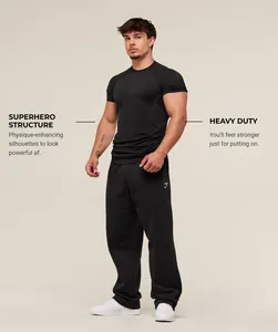 Professional detail of a black men's muscle fit gym t-shirt with compression fit
