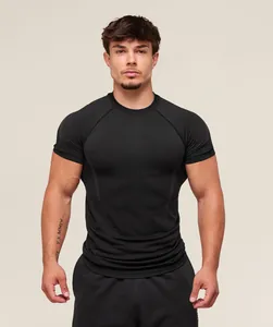 Front view of men's black muscle fit compression gym shirt with breathable chest