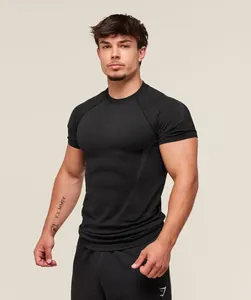 Men's black muscle fit fitness T-shirt with textured chest mesh and raglan sleeves