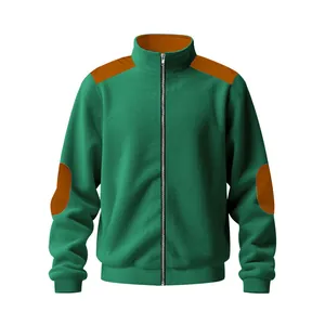Detail view of a green heavyweight cotton velvet jacket with retro brown patchwork designs