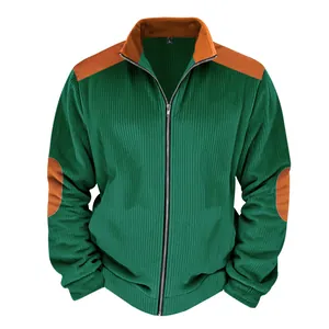 Detailed front view of green corduroy jacket with brown vintage shoulder and elbow patches