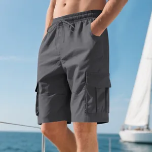 Detailed view of men's gray cargo shorts featuring elastic waist and side pockets
