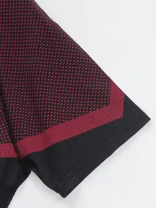 Close-up detail of breathable quick-dry fabric on men's sports fitness T-shirt