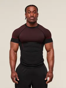 Professional men's muscle fit compression fitness t-shirt in black and burgundy mesh