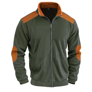 Detail view of retro men's olive green ribbed jacket with orange shoulder patches