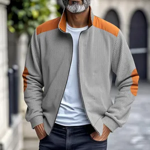 Detail of a men's vintage grey striped jacket with orange shoulder and elbow patches.