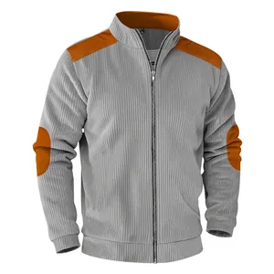 Detailed front view of men's grey corduroy jacket with orange color block patches