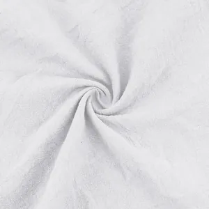Macro view showing the breathable texture and natural weave of white linen fabric