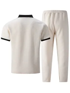 Back view detail of men's cream jacquard polo shirt and matching casual long pants set