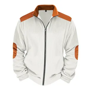 Close-up of men's vintage patchwork jacket with stand collar and zipper detail.