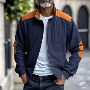 Detail view of men's heavy cotton fleece jacket with contrast orange patches and standing collar