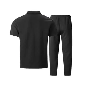 Rear view of men's black jacquard short-sleeved Polo shirt and long pants set