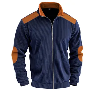 Detail of premium corduroy jacket showing contrast patches and stand collar with zipper