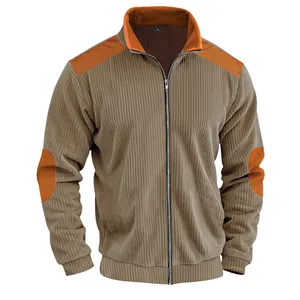 Close-up of a men's heavy velvet jacket with stand collar and orange patches.