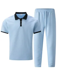 Men's jacquard polo shirt and trousers set in light blue with black contrast collar.