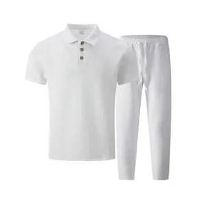 Macro shot of the jacquard texture on white men's polo shirt and leisure pants set