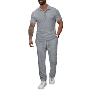 Men's stylish grey polo shirt and pants casual set featuring jacquard textured fabric