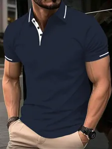 Detailed view of navy blue men's polo shirt with contrast white piping and buttons