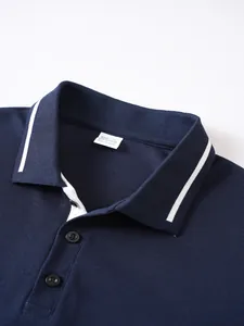 Detailed close-up of men's navy polo shirt collar with white stripe and size tag.